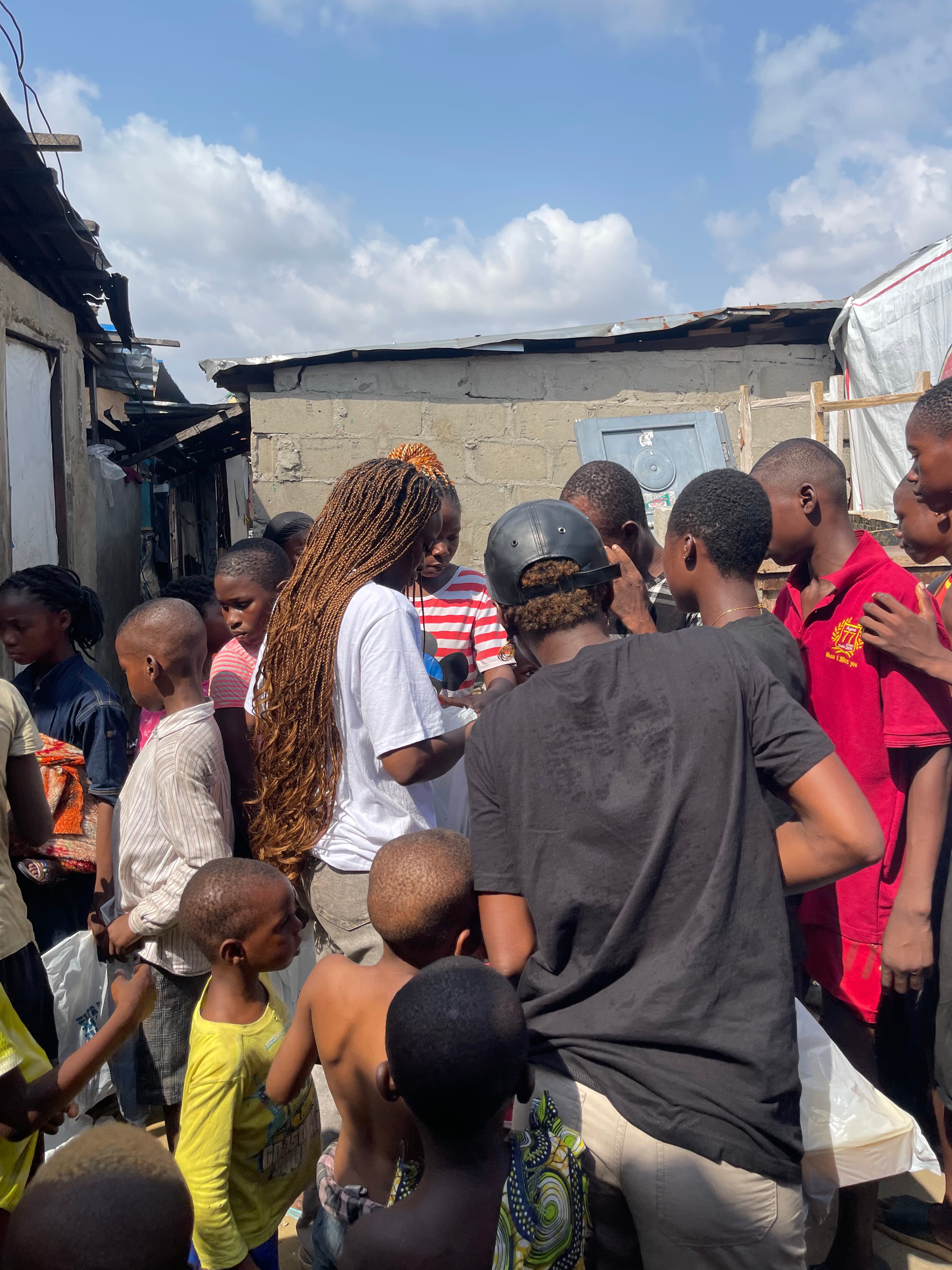 Community members receiving meal packs